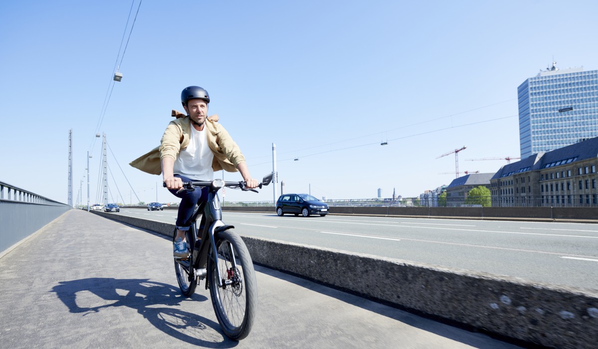 Man driving on the road on a Stromer ST7 