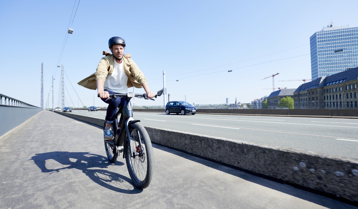 Man driving on the road on a Stromer ST7 